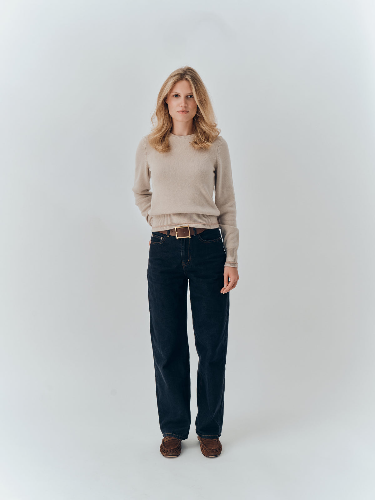 Aria Jumper in Oat cashmere, full-length view worn with jeans