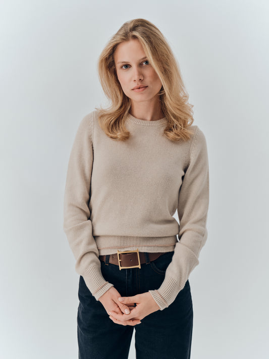 Aria Jumper in Oat cashmere, worn with black jeans