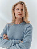 Aria Jumper in Sky Blue cashmere, showing the cream tipped cuffs