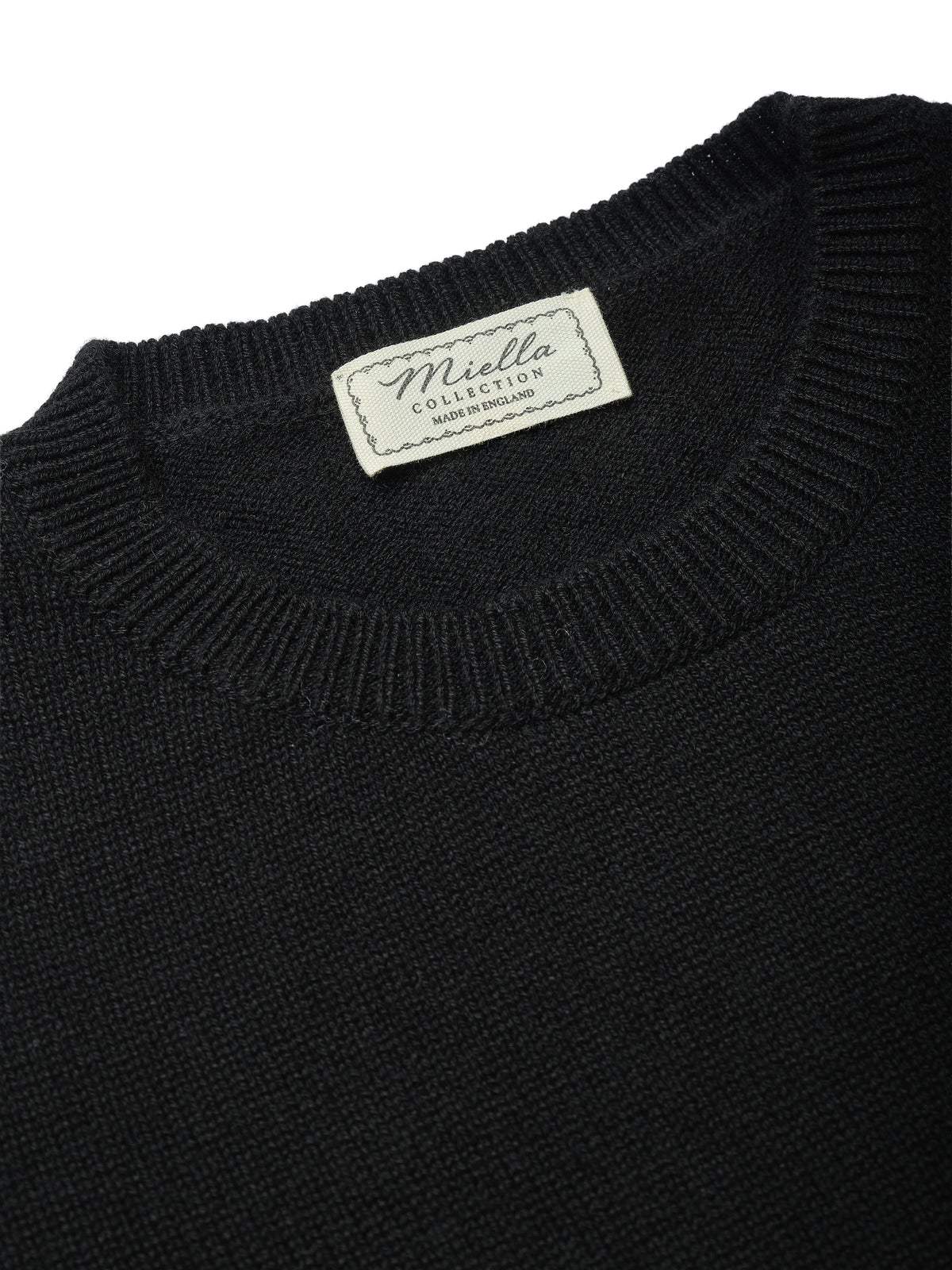 Miella Collection label inside the Betsy Jumper in Black