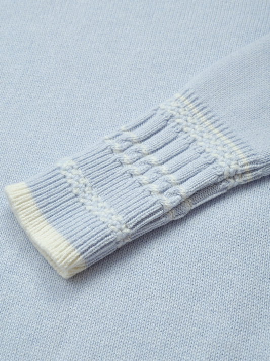 Close-up of the knit and trim detail on the Betsy Jumper in Powder Blue
