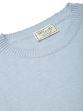 Miella Collection label inside the Betsy Jumper in Powder Blue