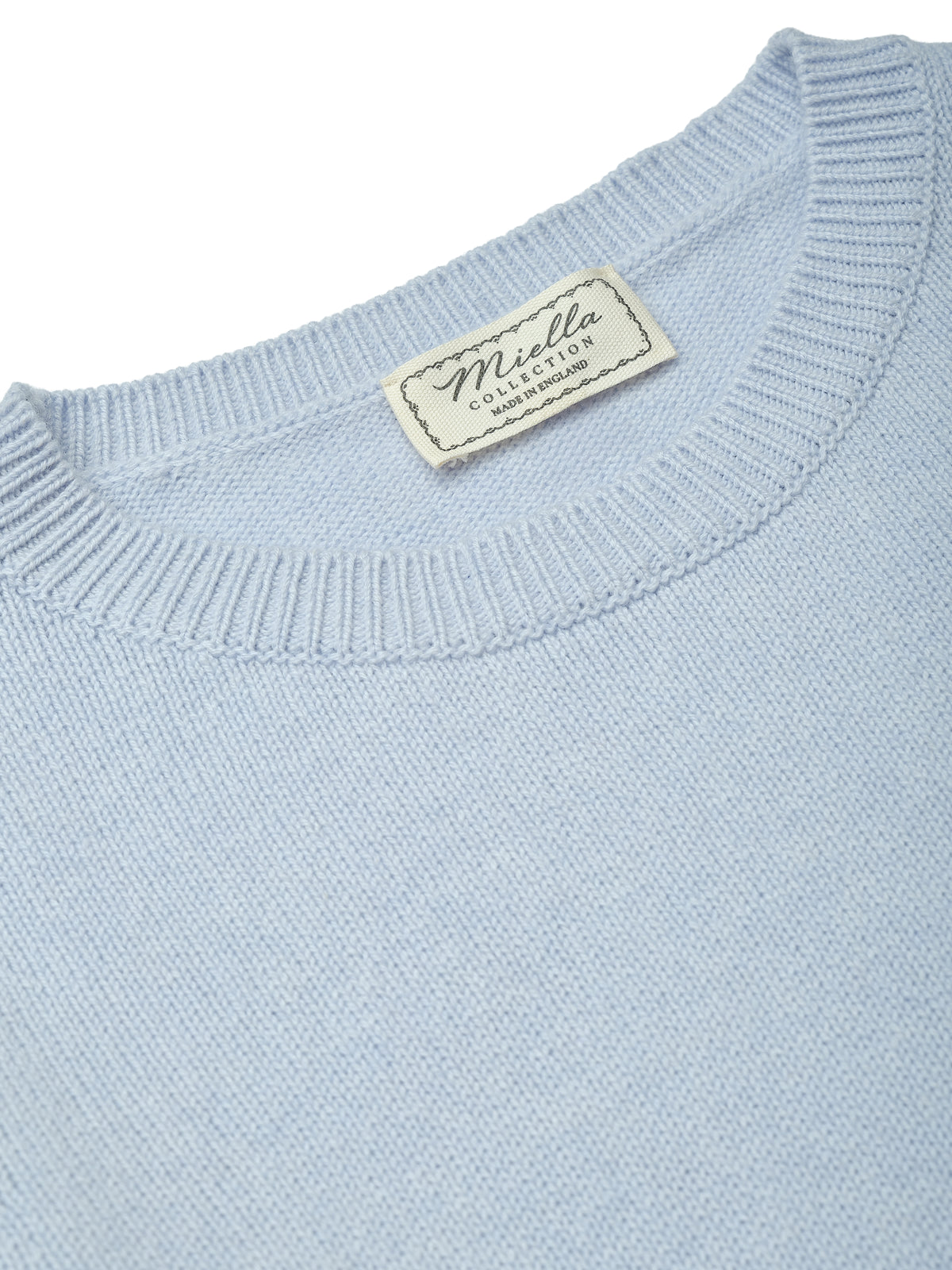 Miella Collection label inside the Betsy Jumper in Powder Blue