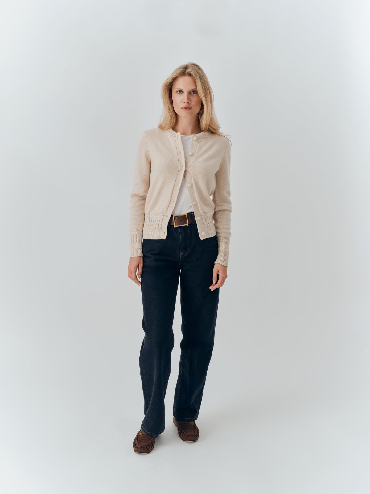Emma Cardigan in Champagne cashmere, full-length view worn with dark jeans
