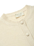 Miella Collection label inside the Emma Cardigan in Champagne