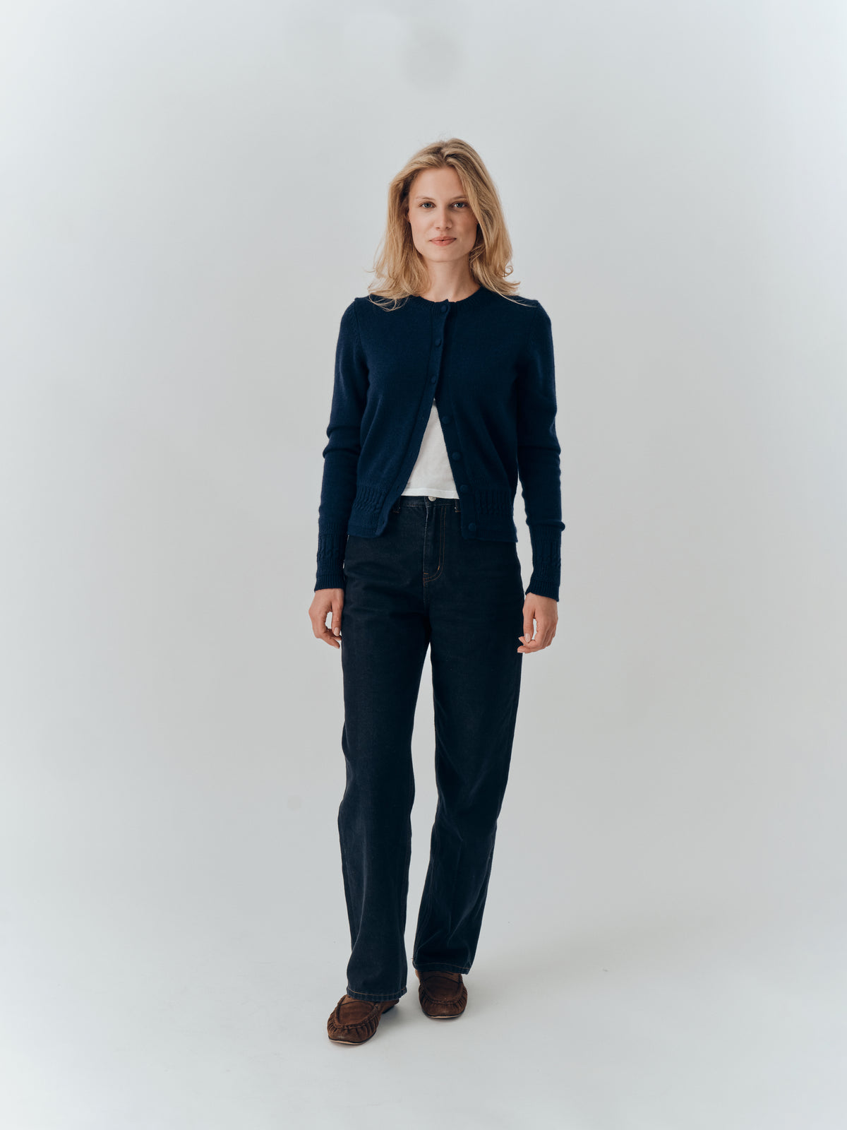 Emma Cardigan in Navy cashmere, full-length view worn open with dark jeans