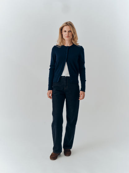 Emma Cardigan in Navy cashmere, full-length view worn open with dark jeans