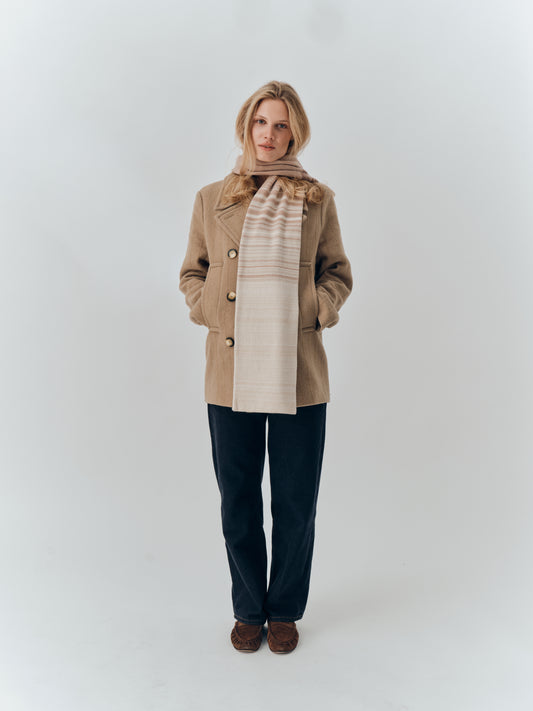 Gradient Scarf in Sandstorm worn with a camel wool coat