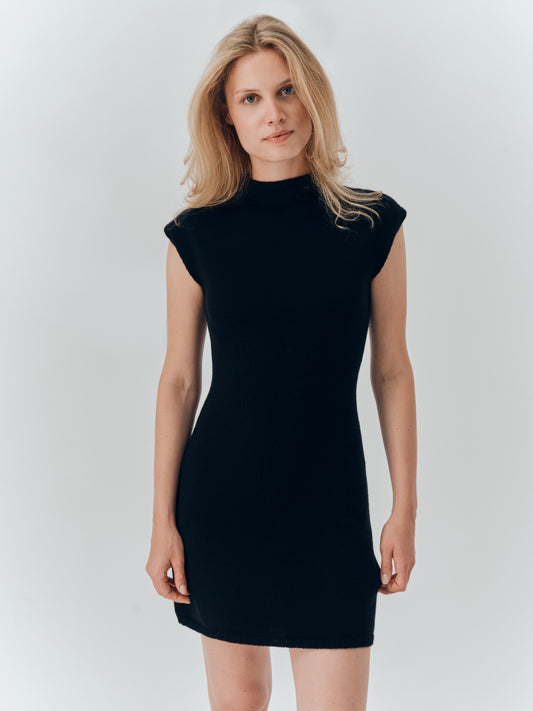 Lenna Dress in Black cashmere, showing the mock neck and cap sleeve
