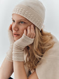 Cashmere wrist warmers in Champagne worn with the Cable Knit Beanie in Champagne
